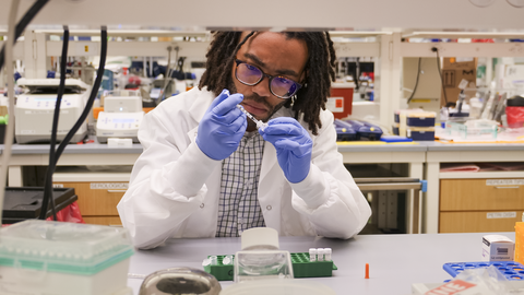 Person working at a lab bench 